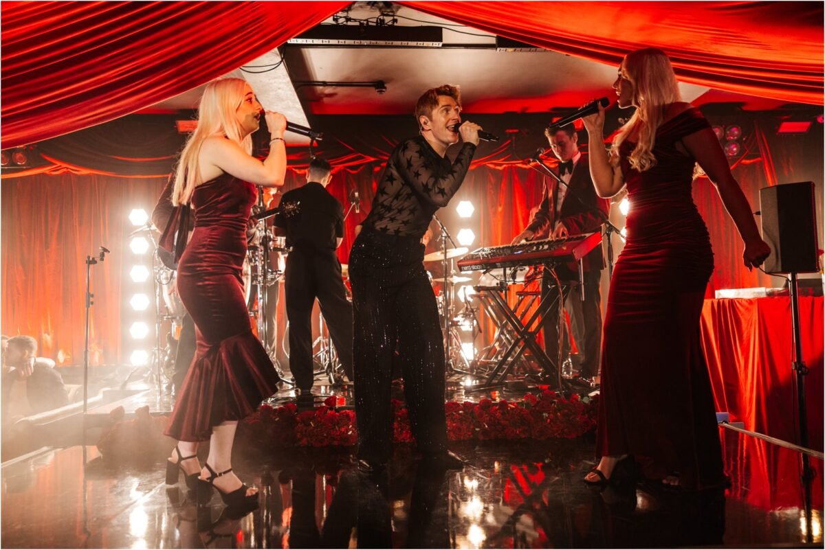 singer on stage impossible event venue manchester